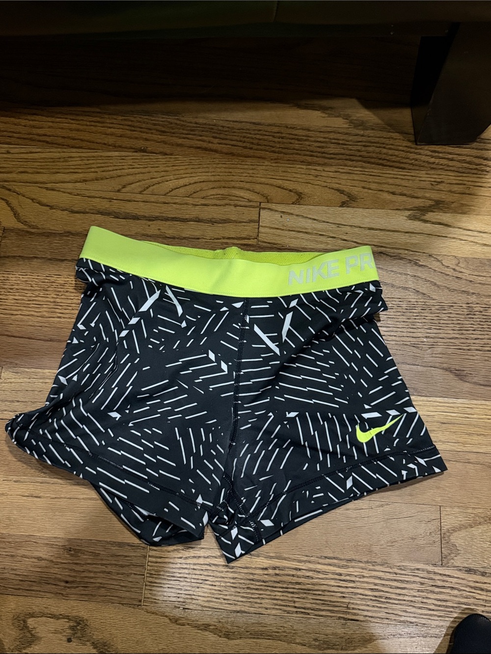 Nike Black Athletic Compression Shorts with Neon Yellow Waistband